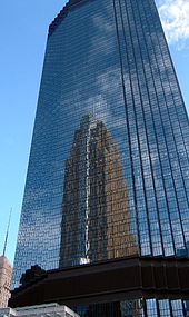 The IDS Tower, designed by Philip Johnson, is the state's tallest building, reflecting Cesar Pelli's Art Deco-style Wells Fargo Center. IDS reflecting Wells Fargo.jpg