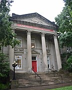 Tetrastyle columns with Corinthian capitals.