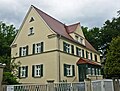 Doppelwohnhaus mit Einfriedung (Einzeldenkmal zu ID-Nr. 09306638)