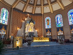 The main altar where the baldacchino with the enthroned La Naval image