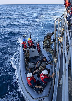 US and Pak Navy VBSS teams boards ship during a joint exercise