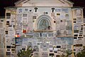 Ex-voto plaques on a wall at the Roman Viale Trastevere