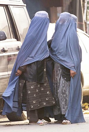 Women wearing burqas in the street