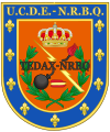 Emblema de la Unidad Central de Desactivación de Explosivos y [Defensa] Nuclear, Radiológica, Biológica y Química (UCDE-NRBQ)