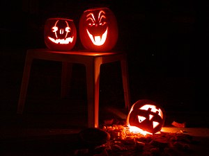 Three Halloween jack-o'-lanterns.