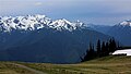 Mount Fitzhenry (centered) as seen from Hurricane Hill, with Cat Peak behind right, and Mt. Carrie to left