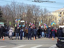 Protesters around a statue of Taras Shevchenko on Heroes Square in Luhansk, waving both Russian and Ukrainian flags, 1 March 2014 Russian spring (Luhansk 01.03.2014) 01.JPG