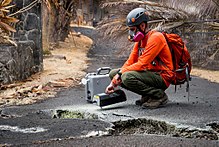 US Geological Survey volunteer tests for sulfur dioxide after the 2018 lower Puna eruption. 20180519 USGS Leilani Estates Hawaii Volcanic EruptionDSC 0411 medium.jpg