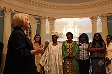 In 2012, Ambassador-at-Large for Global Women's Issues Melanne Verveer greets participants in an African Women's Entrepreneurship Program at the State Department in Washington, D.C. Ambassador Verveer Greets African Womens Entrepreneurship Program Participants.jpg