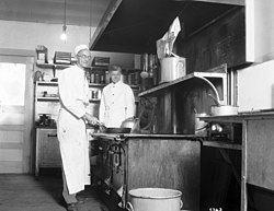 Cooks in kitchen, 1930 (20981103874)