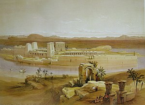 Painting of an island seen from across a river channel. On the island stand a series of stone buildings, gateways, and colonnades.