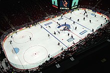 The Vancouver Canucks and the Edmonton Oilers warm up before a match at General Motors Place in October 1997. GM Place 1997.jpg