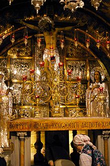 The altar at Golgotha in the Church of the Holy Sepulchre, Jerusalem. In the centre is an Orthodox tabernacle. Holy sepulcher calvary.jpg