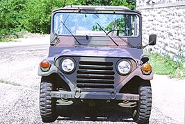 Due to Willys' trademark, Ford had to use a different design on their M151 ¼-ton 4×4 utility truck, opting for horizontal slots.