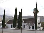 This T-shaped Cape Dutch house was erected in 1854 and is one of the three oldest houses in Montagu. In June 1880 S.J.P. Kruger and General P. J.Joubert were entertained in this house. Type of site: House. Previous use: House. Current use: Museum.