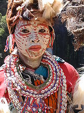 A Bantu Kikuyu woman in traditional attire Kikuyu woman traditional dress.jpg