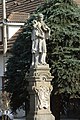 A statue in front of the castle