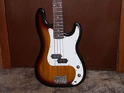 A sunburst-colored Fender Precision Bass