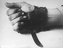 The Srbosjek ("Serb cutter"), an agricultural knife worn over the hand that was used by the Ustase for the quick slaughter of inmates. Srbosjek (knife) used in Croatia - 1941-1945.jpg