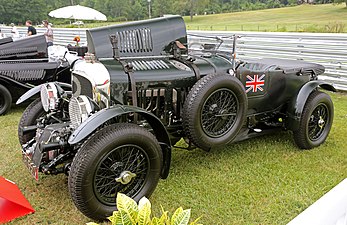 A 1929 Bentley colored British racing green.