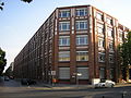 Glühlampenfabrik in Moabit, Sickingenstr. 70/71; erbaut 1907–1912, ab 1920 Osram-Werk A (wie AEG), ab 1939 Telefunken - Werk für Elektronenröhren, seit 2005 Jobcenter Berlin-Mitte