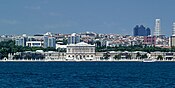 Swissôtel Istanbul The Bosphorus Hotel seen from the Bosphorus on the left side behind the Dolmabahce Palace.