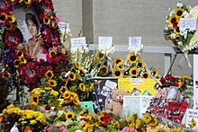 Portrait tribute, other tribute items, mural and messages from 650 Spanish fans, letters, pictures, teddy bears, sunflowers and other kind of flowers were dropped off by fans from all over the world at Forest Lawn Memorial Park on the first anniversary of Michael Jackson's death.