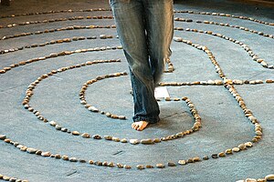 A woman walking a prayer labyrinth
