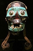 The Mask of Tezcatlipoca; 1400–1521; turquoise, pyrite, pine, lignite, human bone, deer skin, conch shell and agave; height: 19 cm, width: 13.9 cm, length: 12.2 cm; British Museum