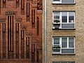 Facade detail showing Jensen-Klint's characteristic brickwork next to the facade of the neighbouring building