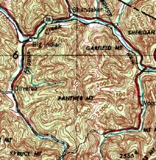 A green topographical map showing a nearly complete circular stream valley around Panther Mountain, accentuated by red lines indicating roads.