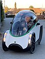 En helt lukket velomobil med bobledeksel fra det norske selskapet Podbike