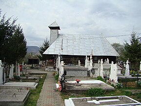 Biserica și cimitirul
