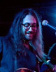 Sean Lennon is the son of Japanese multimedia artist Yoko Ono, and English and Irish descended John Lennon.[192]