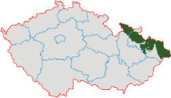 Czech Silesia (green) and the so-called Moravian enclaves in Silesia (red) in relation to the current regions of the Czech Republic