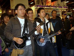 2008 Taipei Game Show: Gamers play Guitar Hero...