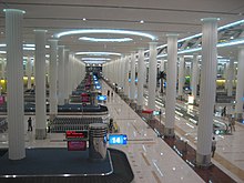 Arrivals hall in DXB Terminal 3 (3344510514).jpg