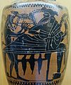 Satyre jouant de l'aulos devant Dionysos allongé. Lécythe attique à figures noires, fin du VIe siècle-début du Ve siècle av. J.-C.