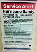 An MTA service alert at 46th Street–Bliss Street station, warning of pending service interruptions due to due to impending Hurricane Sandy, October 2012.