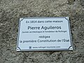 Plaque d'informations indiquant : En 1814 dans cette maison, Pierre Aguileros rédigea la première constitution de l'État