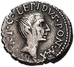 Grey coin depicting male head facing right