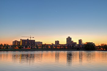 The skyline of New Brunswick seen at sunset along the Raritan River, the longest river solely within New Jersey