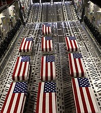 Remains of US service members aboard a military transport plane at Hamid Karzai International Airport, 27 August 2021 SPMAGTF-CR HKIA Ramp Ceremony.jpg