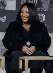Photograph of director Stella Meghie sitting at an event in 2020.