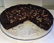 Chocolate torta paesana with raisins and pine nuts