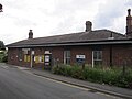 The station as viewed from the roadside drop-off point.