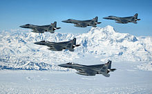 Five 60th Fighter Squadron F-15Cs soar over the Alaska mountains while participating in Red Flag Alaska 07-1 33dog-f-15-1.jpg
