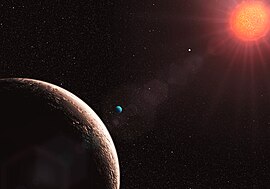 Hvězda Gliese 581 s planetou v představě umělce