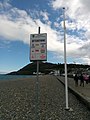 Cartello di spiegazione delle bandiere di avviso dei bagnini a Bray, Irlanda