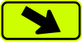 W16-7PR Downward diagonal arrow to the right (plaque)